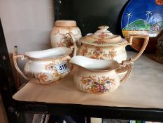 A Crown Devon 3 piece tea set & a biscuit barrel