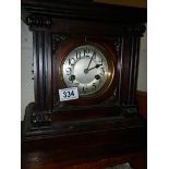 An Edwardian mantel clock.
