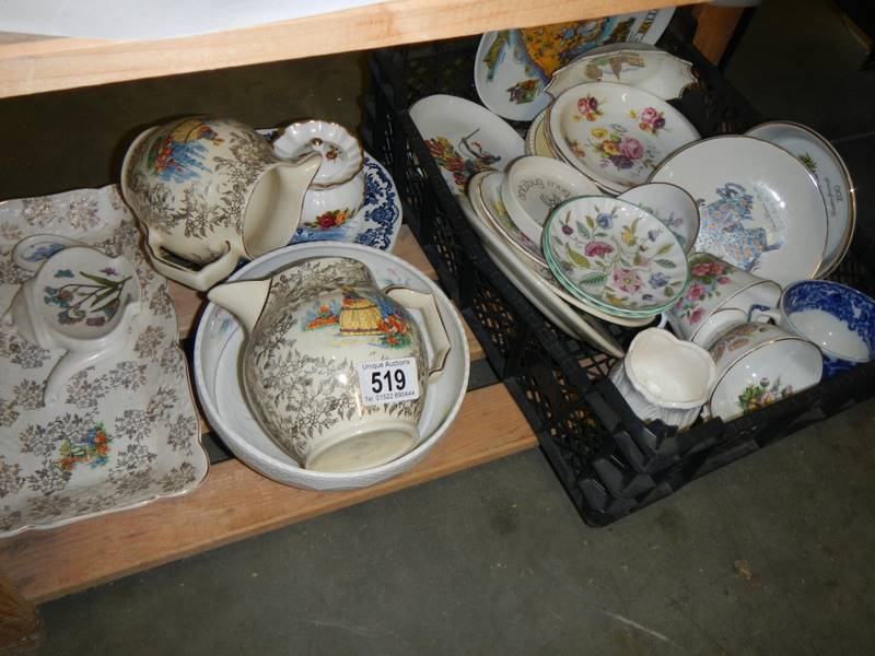 A shelf of assorted ceramics.