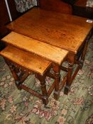 A nest of three oak tables. COLLECT ONLY.