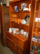 A teak four drawer dresser. COLLECT ONLY.