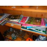 A quantity of Ordnance survey maps and guide books.