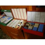 Six boxes of slides and a viewer.