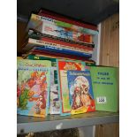 A quantity of mid 20th century children's books including Enid Blyton, Beano etc.,