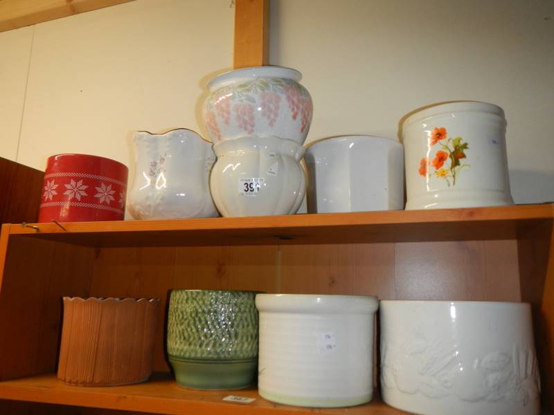 A quantity of ceramic plant pots.