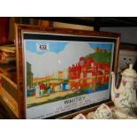 A framed and glazed Whitby railway poster.