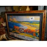 A framed and glazed Yorkshire coast railway poster.