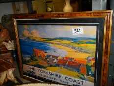 A framed and glazed Yorkshire coast railway poster.