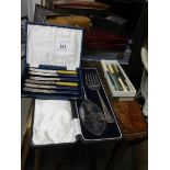 A mixed lot of cased cutlery etc.,