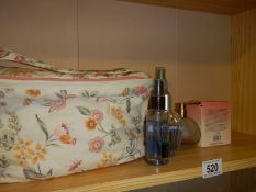 A cosmetic bag and cosmetics.
