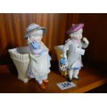 A pair of porcelain boy and girl figures.