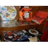 A quantity of picture discs, little angels, glass tiger etc.,
