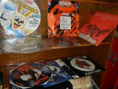 A quantity of picture discs, little angels, glass tiger etc.,