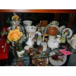 A shelf of assorted ceramics.