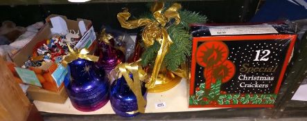 A quantity of Christmas decorations including bell, tree, ornaments & crackers etc.