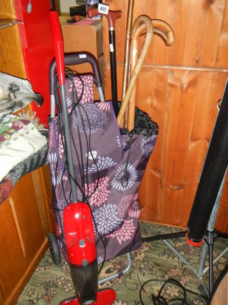 A shopping trolley, walking stick and steam cleaner. COLLECT ONLY.