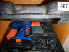 An electric power drill.