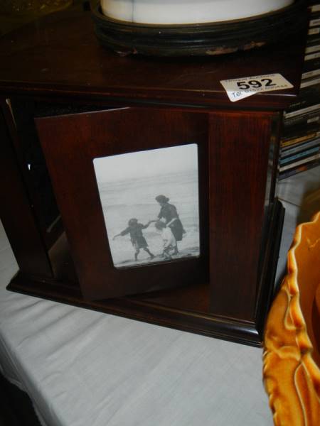 A mahogany photograph box.