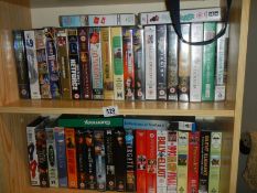 Two shelves of video's.