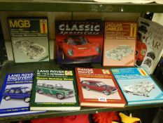 A quantity of car manuals etc.,