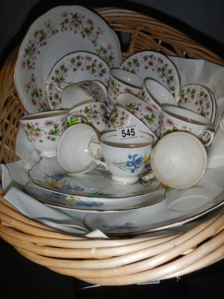 A basket of assorted tea ware.