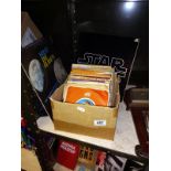 A quantity of 45 rpm records & Star Wars & Holst the Planets LP's