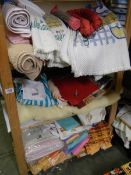 Three shelves of assorted household textiles. COLLECT ONLY.