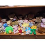 A mixed lot of soft toys.