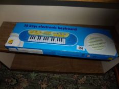 A boxed child's keyboard.