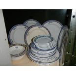 A quantity of dinner ware.