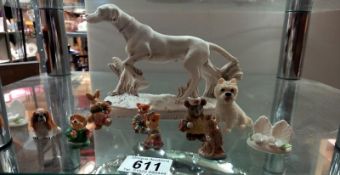 A dog and other figures.