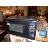 A Sharp microwave oven, COLLECT ONLY.