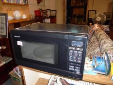 A Sharp microwave oven, COLLECT ONLY.