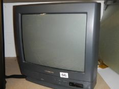 A small Hitachi TV.