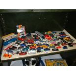 A mixed lot of playworn die cast and plastic vehicles including Lima, Wiking, Matchbox etc.,