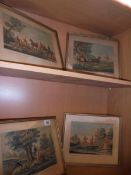 A set of four framed and glazed French hunting scenes.