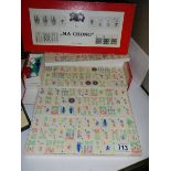 A Mahjong set and a set of dominoes.
