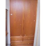 A teak drawer base wardrobe. COLLECT ONLY.