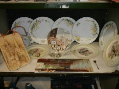 A shelf of assorted plates etc.,