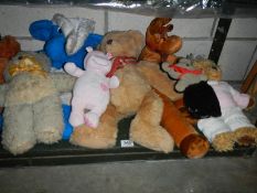 A mixed lot of vintage soft toys.
