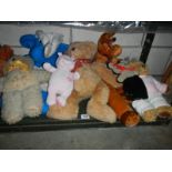 A mixed lot of vintage soft toys.