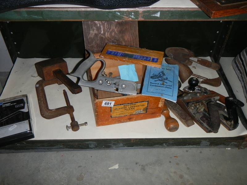 A shelf of planes including Record.