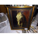 A framed study of a horses head.