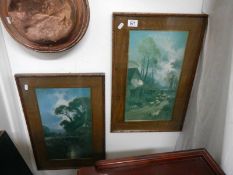 A pair of oak framed prints. COLLECT ONLY.