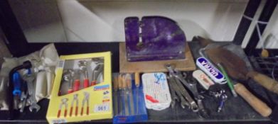 A mixed lot of hand tools.