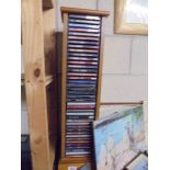 A CD stand and a mixed lot of CD's. COLLECT ONLY.