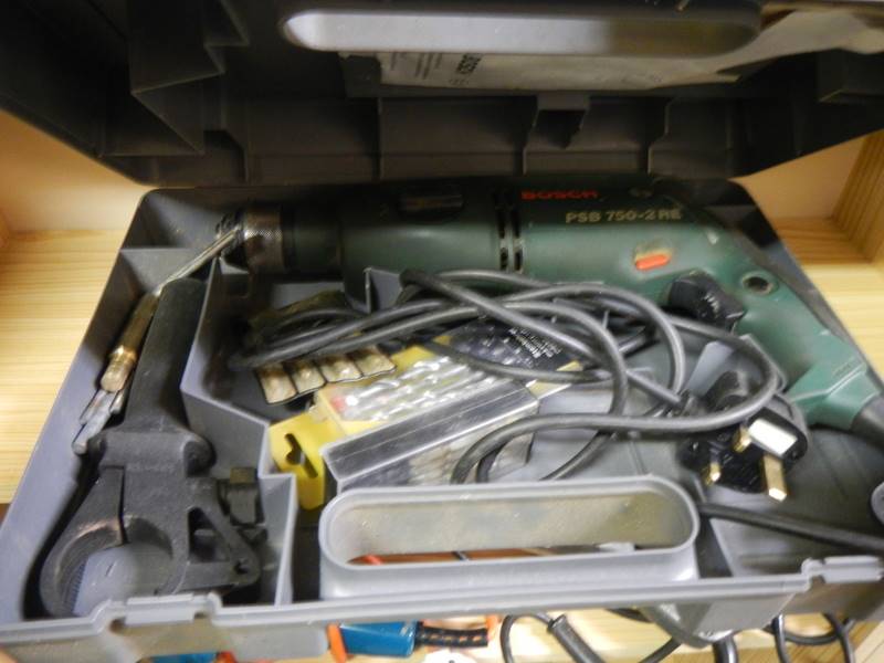 A cased Bosch PSB 750-2 RE drill. COLLECT ONLY. - Image 2 of 2
