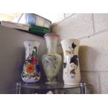 Three ceramic vases.