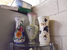 Three ceramic vases.