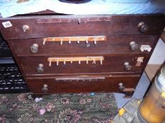 An old four drawer chest, a/f.